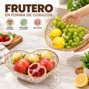 Frutero transparente en forma de corazón con elegante borde dorado. Ideal para frutas, botanas y decoración del hogar. Venta por mayoreo.