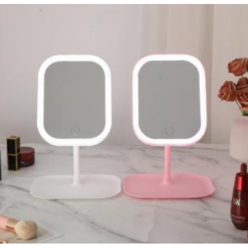 Espejo de maquillaje con luz LED táctil regulable, diseño portátil de mesa en colores rosa y blanco, ideal para rutina diaria de belleza y cuidado personal, Mayoreo WSM-2494