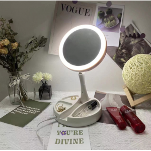 Espejo plegable para maquillaje con luz LED. Su base permite colocarlo sobre una superficie- Por mayoreo 