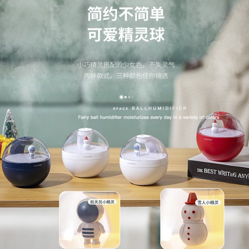 Humidificador en forma de esfera con figuras de astronautas y muñeco de nieve JSQ427