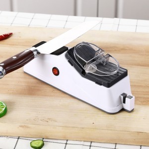 Afilador eléctrico ideal para mantener cuchillos en buen estado. Diseño compacto y práctico para cocina. Medida aprox. 23 cm. Venta por mayoreo