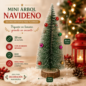 Mini árbol navideño decorativo de 20 cm con acabado nevado, esferas de colores y base tipo tronco. Ideal para mesas, oficinas y espacios pequeños.