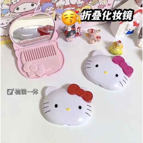 Mini espejo de maquillaje  plegable portátil con peine, con diseños animados por Mayoreo 1070