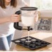 Dispensador manual de masa con depósito graduado y palanca de control, ideal para preparar cupcakes, hotcakes, muffins y repostería en general sin derrames. Por Mayoreo 34142-140