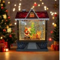 Casita iluminada navideña con Santa Claus y regalos, efecto nieve y luces LED cálidas, Por Mayoreo D-21765
