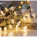 Guirnalda de luces LED cálidas en forma de campanita transparente, perfecta para decorar espacios elegantes, habitaciones, macetas o eventos especiales Por Mayoreo D-22092