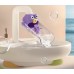 Extensor de grifo infantil con forma de pez. Facilita que los niños alcancen el agua para lavarse las manos de manera divertida y segura. Por Mayoreo W-RWJG5257