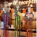 Set de decoraciones colgantes con diseños de calaveras mexicanas, estilo catrina y mariachi, acompañadas de tiras metálicas en colores vivos. Por Mayoreo 