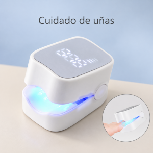 Dispositivo portátil de luz azul para cuidado de uñas. Diseño compacto en color blanco, apertura tipo pinza y pantalla superior. Venta por mayoreo.