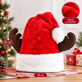 Sombrero navideño de peluche con cuernos de reno para niños, medida aproximada de 30 x 38 cm. Ideal para fiestas y temporada navideña. Venta por mayoreo.