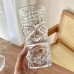 Vaso Totem de cristal transparente con diseño tallado único, ideal para agua, jugos, cócteles o bebidas refrescantes. Capacidad de 400ML