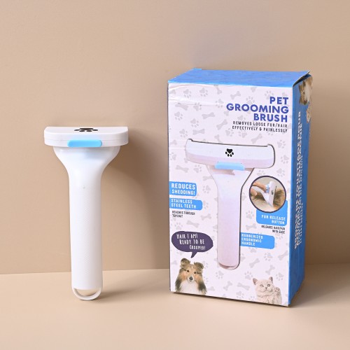 Cepillo removedor de pelo para mascotas con diseño ergonómico y sistema de autolimpieza. Ideal para perros y gatos, elimina el pelo suelto y subpelo de manera rápida y eficiente sin lastimar la piel. Venta por mayoreo 4964