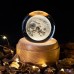 Lámpara decorativa en forma de esfera de cristal con grabado 3D de galaxia iluminada. Incluye base de madera con luz LED cálida Venta al por mayor  60600