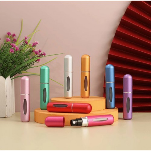 Lleva tu fragancia favorita siempre contigo con este atomizador recargable de aluminio 5ml, práctico, elegante y resistente, ideal para bolso o viajes. Venta al por mayor CL-134120