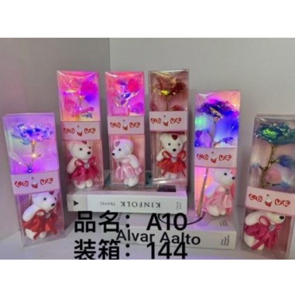 Flor decorativa de papel holográfico con iluminación LED integrada y osito tierno. Ideal como regalo romántico para San Valentín, aniversarios, cumpleaños o detalles. Venta por mayoreo 3421