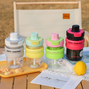 Vaso portátil de 600ml con diseño moderno y práctico. Incluye dos boquillas intercambiables para bebidas. Venta por mayoreo