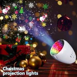 Proyector navideño con 16 diseños multicolor de copos de nieve y figuras festivas, ideal para decorar paredes y distintos espacios. Venta por mayoreo