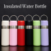 Termo liso de acero inoxidable con capacidad de 450ml, colores surtidos con tapa y anillo metálico decorativo. Venta por Mayoreo 