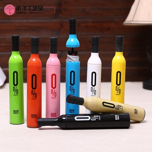 Paraguas mini manual compacto con funda tipo botella y filtro solar. Diseño portátil ideal para lluvia o sol. Colores surtidos. Venta por mayoreo modelo S-90