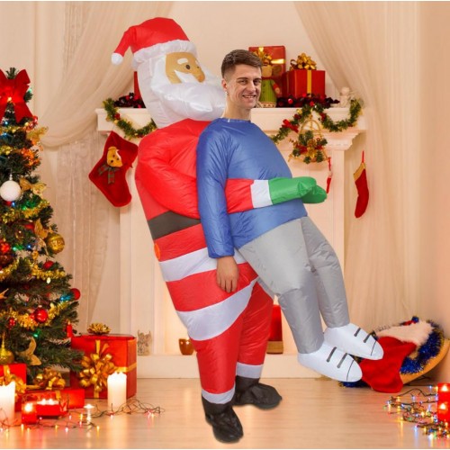 Disfraz inflable de Santa Claus cargando, perfecto para fiestas navideñas, shows y eventos. Incluye sistema inflable con ventilador que da volumen VENTA AL POR MAYOR  TA-3030