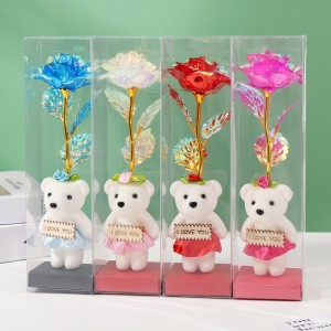 Oso decorativo con flor artificial y luz LED integrada. Ideal como regalo, decoración, escritorio o detalle especial para San Valentin. Venta por mayoreo XH-0300.