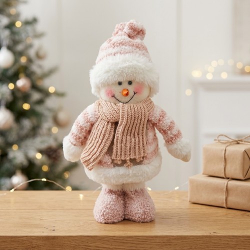 Muñeco de nieve navideño rosa de 30 × 16 × 9 cm con gorro y bufanda, ideal para decorar hogares y espacios festivos. Venta por mayoreo