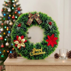 Corona navideña de 30 cm con flores de Nochebuena, moño y detalles decorativos, ideal para adornar puertas y espacios festivos. Venta por mayoreo