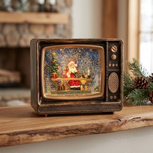 Farol navideño con luz y efecto de nieve en forma de televisión retro, con escena de Santa Claus para ambientar espacios festivos. Venta por mayoreo