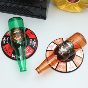 Juego giratorio “Gira la Botella” ideal para fiestas y reuniones. Incluye botella plástica, base tipo ruleta con desafíos, shots y retos divertidos Venta al por mayor ZE-2852 